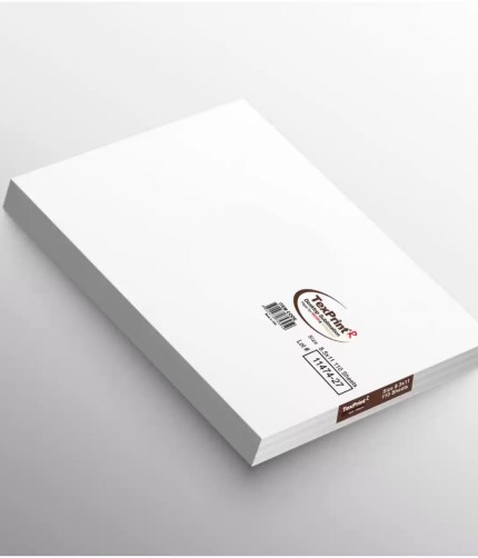 A stack of TexPrint R desktop sublimation paper sheets showing the product label with item code, lot number 11474-27, and 8.5x11 inch size indication.