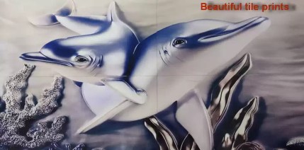 A multi-tile sublimation print featuring two dolphins swimming amidst coral and seaweed, labeled with the text "Beautiful tile prints"