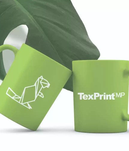 Two lime green mugs featuring a white geometric beaver logo and the TexPrint MP brand text, displayed in front of a tropical leaf.