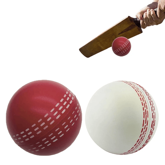 Red and white soft PU cricket balls with a hand holding a wooden bat hitting a red ball.