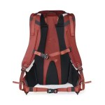 Rear view of a red and black ski backpack featuring padded shoulder straps, chest strap, adjustable hip belt, and supportive back design.