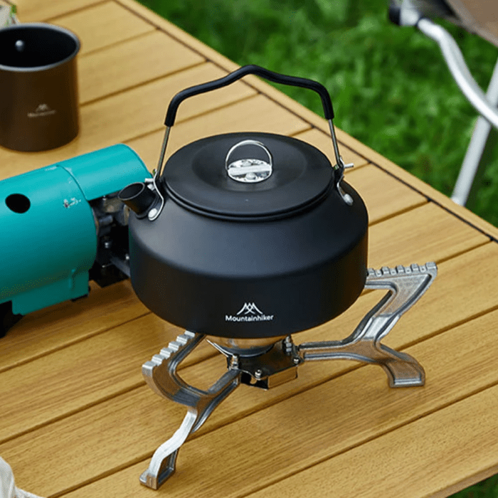 Compact metal kettle for backpacking and outdoor sports missions.