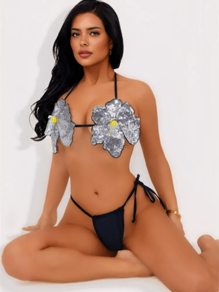 Woman wearing silver flower sequin bikini