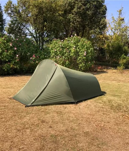 2 person tent shown with camping mats for tents and a trekking rucksack.