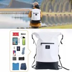 A kayaker wearing the floating dry backpack while paddling on a river.