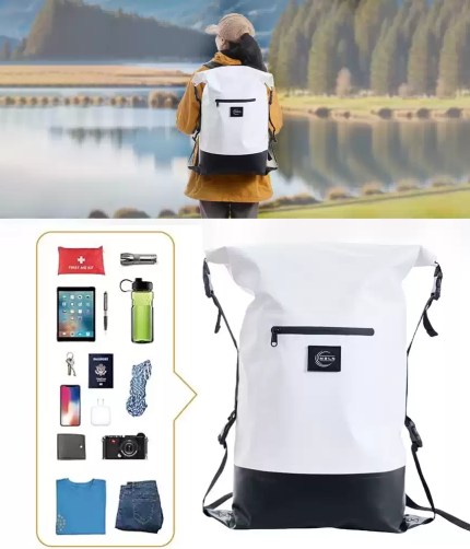 A kayaker wearing the floating dry backpack while paddling on a river.