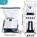 The dry bag packed with a towel and electronics for a beach trip.