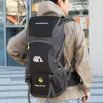 Close-up of the waterproof fabric on the 50L hiking bag with water droplets beading off.