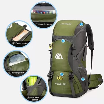 Side view of the mountaineering bag with a water bottle tucked into the mesh pocket.