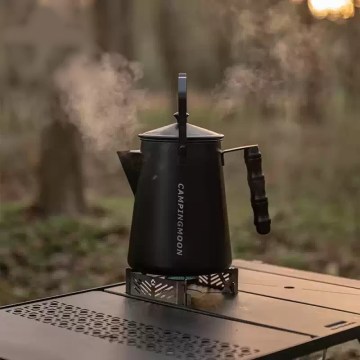 Large capacity hand brewed coffee pot used on a nature hike.