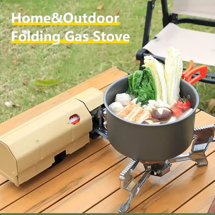 Stainless steel pot boiling on a 2600W fire furnace during a tourist hiking trip.