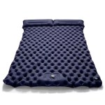 Outdoor camping double inflatable mattress showing its extra wide design and built-in pillows.