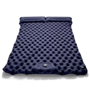 Outdoor camping double inflatable mattress showing its extra wide design and built-in pillows.