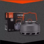 The heat exchanger kettle sitting on a portable camping stove during a nature hike.