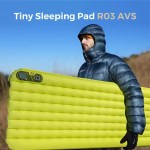 Zero Series insulated sleeping pad shown in ultra-compact folded size next to a camping mug.