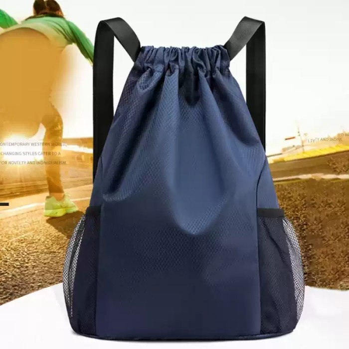LARGE CAPACITY DRAWSTRING BACKPACK_3 The large drawstring bag folded flat to demonstrate its packable travel design.