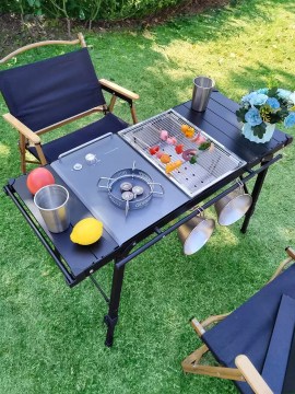 Camping table with built-in gas stove and BBQ grill for outdoor cooking