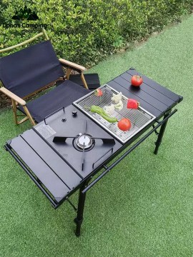 Portable camping table with gas stove and grill, perfect for outdoor cooking