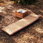 Close-up of the self-inflating valve and thicken sleeping pad foam structure for outdoor comfort.