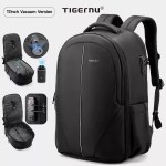 Men's vacuum compression backpack showing the compression valve shrinking the main compartment.