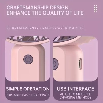 Close-up of the USB charging port on a rechargeable portable fan with its indicator light on.