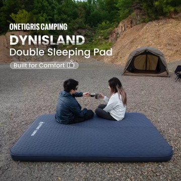 Alt Text: Luxury double sleeping pad for camping with a blue honeycomb surface shown fully inflated inside a glamping tent