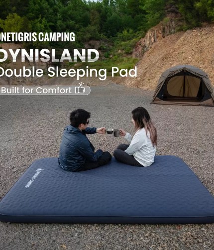 Alt Text: Luxury double sleeping pad for camping with a blue honeycomb surface shown fully inflated inside a glamping tent