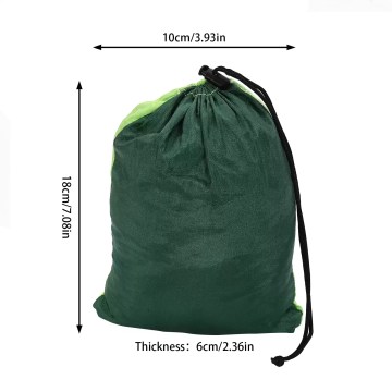 A family enjoying the 300KG capacity hammock at an outdoor garden party.