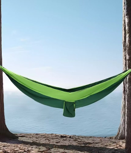 Portable camping hammock in vibrant blue with 300KG load-bearing capacity.