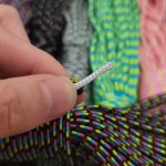 Testing the rot-proof 3mm paracord in a damp outdoor mountaineering environment.