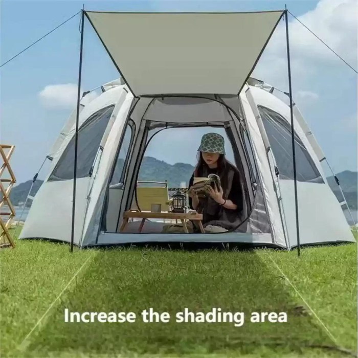 4-PERSON POP-UP FAMILY TENT_1 Spacious 4-man pop-up interior with room for double air mattresses, perfect for family camping trips.