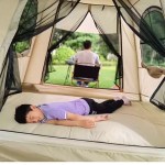 Quick-pitch inflatable camping tent showing the air valve system for effortless assembly on family camping trips.