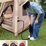 Durable manual air pump and heavy-duty pegs included with a portable inflatable tent for UK wilderness expeditions.