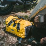 Roll-top waterproof bag on hiking trip.