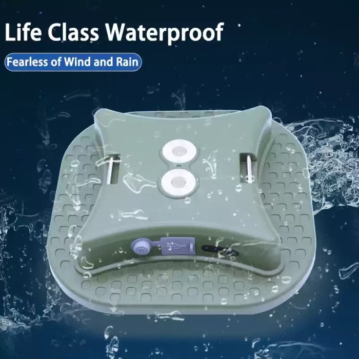 The green camping light shown under water splashes to highlight its life-class waterproof performance and resistance to wind and rain.