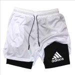 White athletic shorts with a black inner liner and elastic drawstring waist.