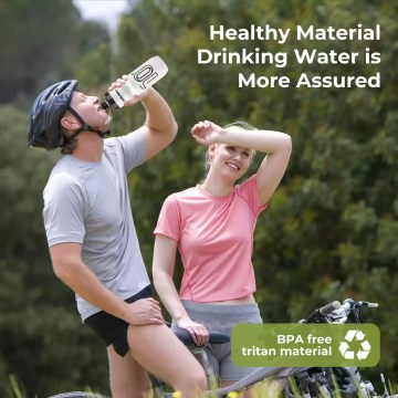 The 750ML portable bottle standing next to a lightweight hiking rucksack.