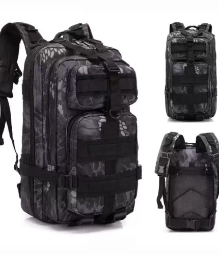 Multiple zippered compartments on tactical 25L backpack for organised UK hiking.