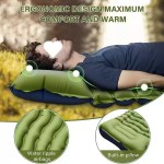 Man resting on inflatable camping mattress with ergonomic built-in pillow