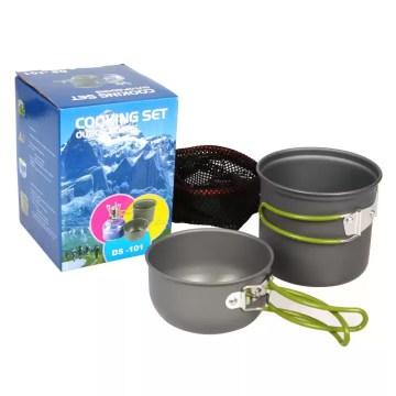 Full camping cookware kit including pots and frying pan shown nested together on a forest floor.