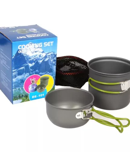Full camping cookware kit including pots and frying pan shown nested together on a forest floor.