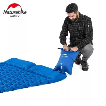 Alt Text: Durable rip-stop nylon material detail of a moisture-proof camping mat designed for rugged outdoor hiking adventures.