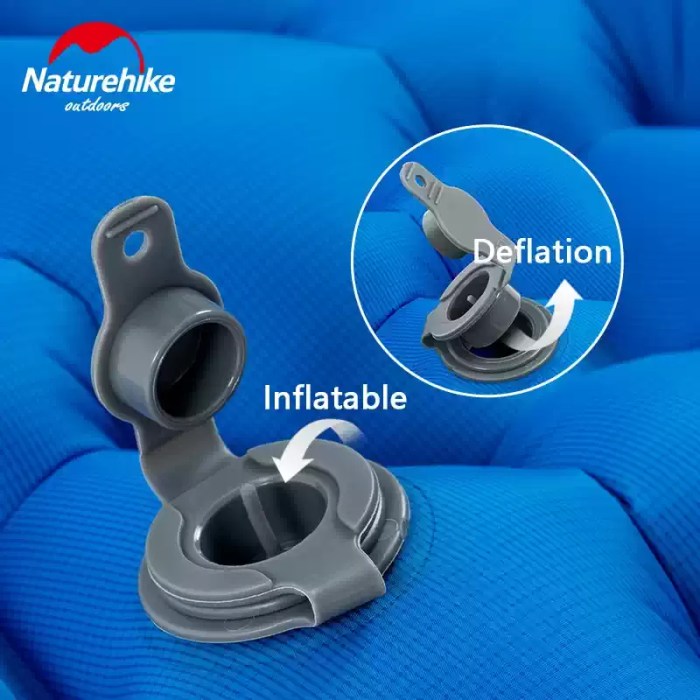 Alt Text: Close-up of the dual-action rapid inflation valve on an ultralight inflatable mattress for quick campsite setup.