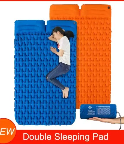 Alt Text: Ultralight 2 person inflatable mattress for couple backpacking shown fully inflated on a scenic mountain campsite.