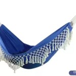 Reinforced suspension ropes and metal loops on the retro tassel hammock.