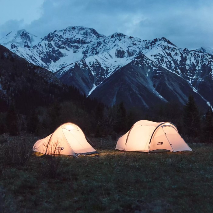 Daban backpacking tent illuminated at night under a starry sky, showcasing its durability as a top-rated 2 person shelter.
