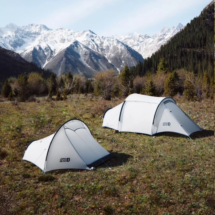 Daban 1-2 person backpacking tent in olive green set up in a forest clearing for ultra-lightweight trekking.