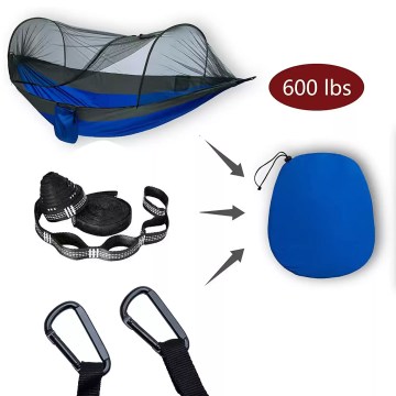 The ultralight hammock packed tightly into its attached travel storage pouch.