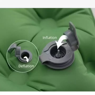 Using the free pump to inflate the portable air bed during a nature hike.