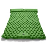 Double inflatable dot mattress in blue with the free air pump shown beside it.